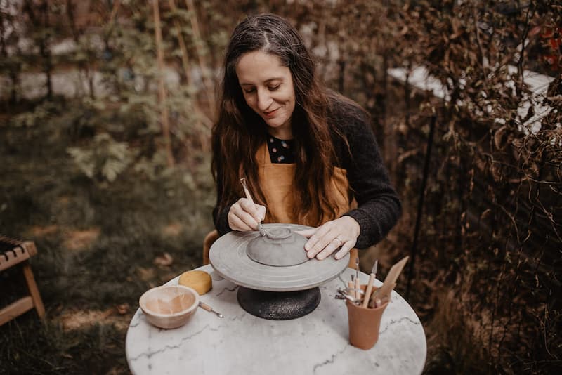 Elisabetta Lombardo working on a clay bowl